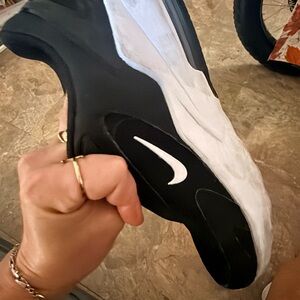 Nike Women's Black Athletic Slip-On Sneakers with White Swoosh